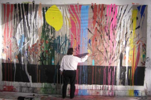 Will Alsop painting a mural
